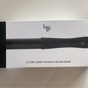 Lange 32 mm titanium curling wand. Never been out of box.